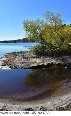 Gorgeous Water View Of Pond In The Fall In New England