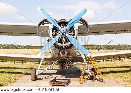 Small Light Airplane Ready To Flight On The Airport Field.