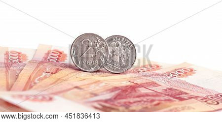 Coin Of 2 Russian Rubles On A Banknote Of 5000 Rubles. Money Of The Russian Federation.