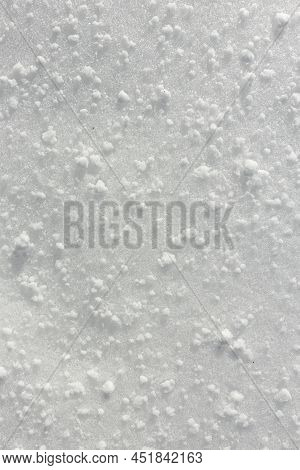 Close Up Of Graupel Snow Pellets, Formed When Supercooled Water Droplets Freeze Onto Snow Crystals