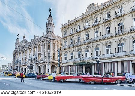 Havana, Cuba - February 15, 2022: Grand Theater Of Havana, Oldest Hotel Inglaterra, Parked Colorful 