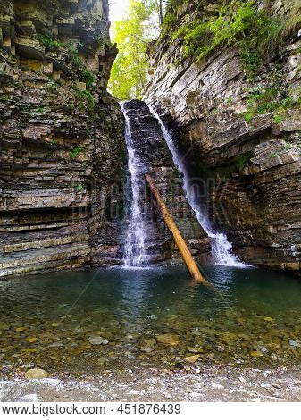 The Bukhtivets Waterfall. Vertical Panorama. Waterfall In The Carpathian Mountains In The Gorge. Cas