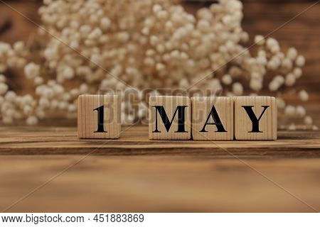 May 1 On The Wooden Calendar.the First Day Of The Spring Month, A Calendar For The Workplace. Spring