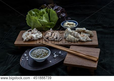 Fresh Grilled Squid, Octopus Tentacles And Squids Eggs On Wooden Tray Served With Fresh Vegetables, 