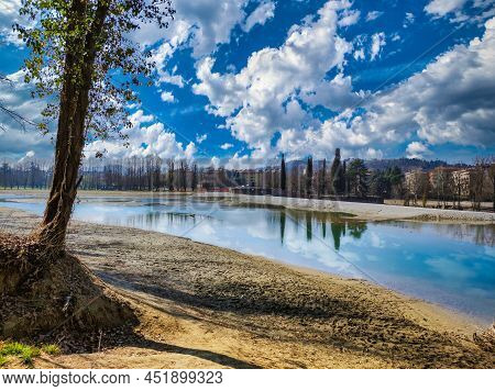 Casalecchio Dam On A Sunny And Cloudy Day Of Spring