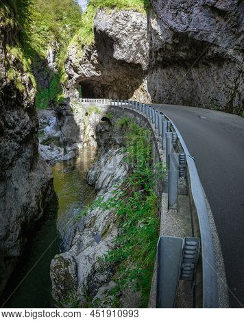 Mountain Road In The Gorge Of The Mountains Near The City In Italy San Pelegrino