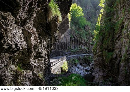 Mountain Road In The Gorge Of The Mountains Near The City In Italy San Pelegrino