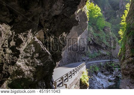 Mountain Road In The Gorge Of The Mountains Near The City In Italy San Pelegrino