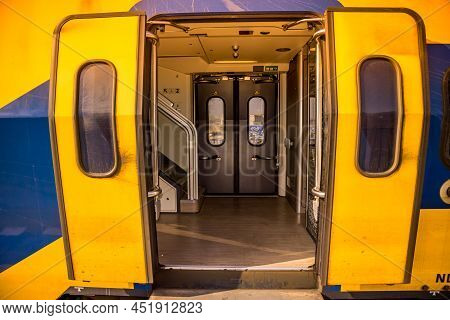 Amsterdam, Netherlands, March 2022. Open And Closed Doors Of A Dutch Train.