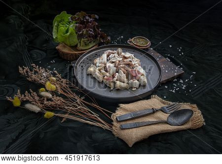 Fresh Grilled Squid, Octopus Tentacles And Squids Eggs On Ceramic Plate Served With Fresh Vegetables