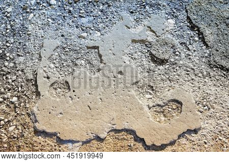 Random Abstract Images On The Old Asphalt Road Surface