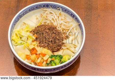Traditional Chinese Pork Meat Cooked In A Salty, Fragrant Sauce, Then Served With Noodles And Variou