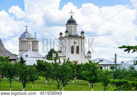 Pasarea Monastery, Orthodox Church Architectural Details. View Of Orthodox Church And Green Churchya