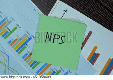 Nps Write On Sticky Notes Isolated On Wooden Table.