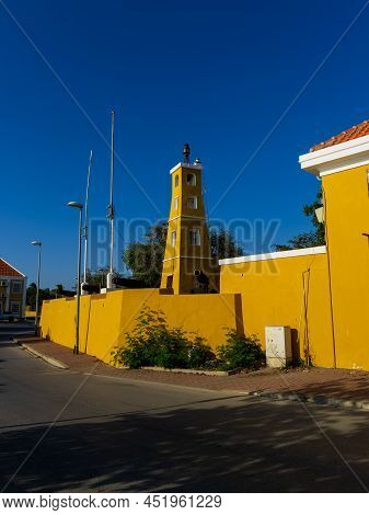 Kralendijk Bonaire - October 6, 2013: Old Fortress, Gun And Lighthouse