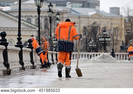 Workers During Street Cleaning. Janitors With Shovels, Snow Removal  In Spring City
