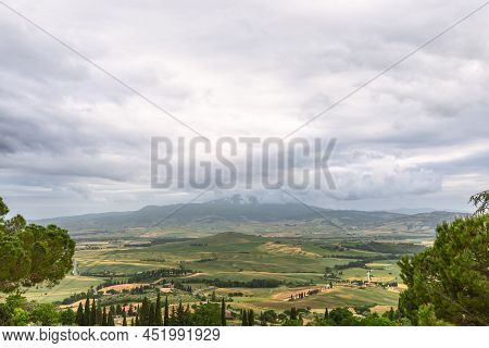 Tuscany - Italy. June 04, 2021: View From Pienza Historic Center To The green  Valley Down. Val D'or