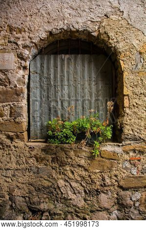 A Window In A Derelict House In Poffabro, An Historic Medieval Village In The Val Colvera Valley In 