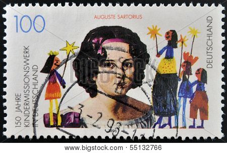 stamp printed in Germany shows Children´s Missionary Work in Germany portrait Auguste Sartorius