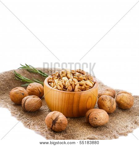 Hazelnuts, filbert on old wooden background