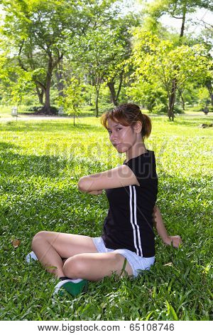 Young Women Sitting With Squirm Her Body