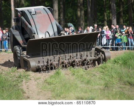 Wroclaw, Poland - May 10. 2014: Bozena-4Nl Carrie Wheeled Remote-control Mine Flail  On Military Sho