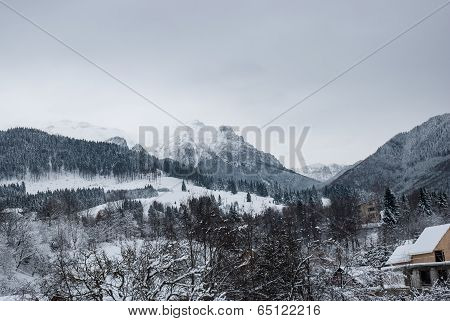 Winter landscape. Mountain village in the Bran,Romanian Carpathians