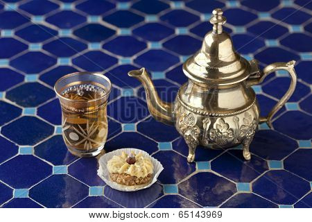  Moroccan tea and cookie on a mosaic table