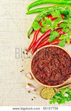 Adjika With Hot Pepper And Fenugreek On Sacking