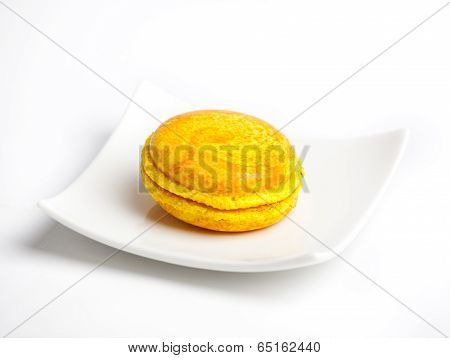 Colorful fresh makarons Cake on a plate