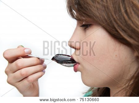 unny teen girl eating charlotte on the white background