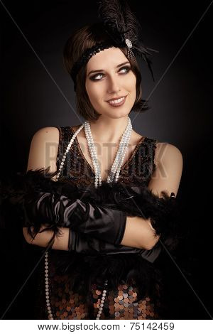 Beautiful retro woman from the roaring 20s ready to party