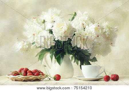 Still-life with a magnificent bouquet and a ripe strawberry