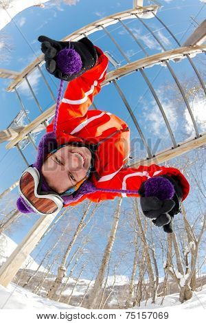 Hanging on the bars after skiing
