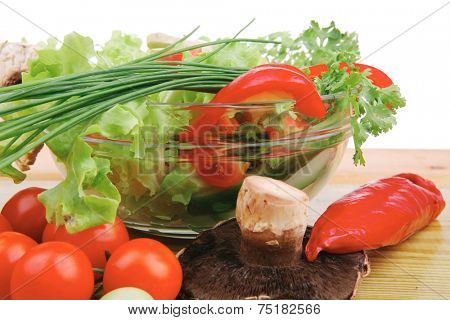 fresh salad and cherry's on wooden table