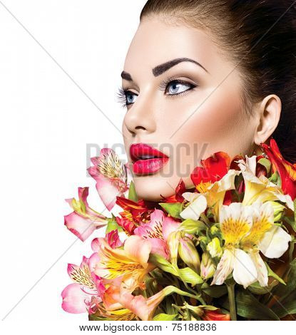 High fashion model girl with colorful flowers and red lips. Vogue style woman portrait with perfect skin. Isolated on white background. Beautiful face makeup. Glamorous lady. Vivid colours 