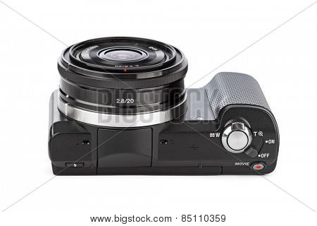 Mirrorless photo camera isolated on white background
