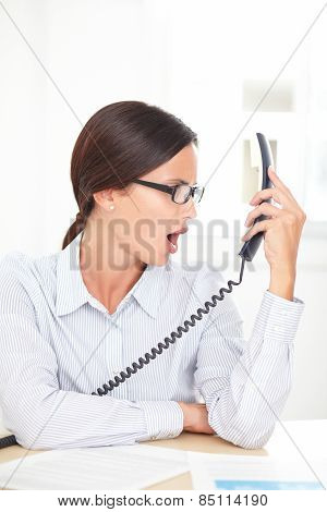 Latin Professional Employee Screaming On The Phone