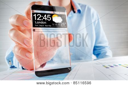 Futuristic Smart phone (phablet) with a transparent display in human hands. Concept actual future innovative ideas and best technologies humanity.