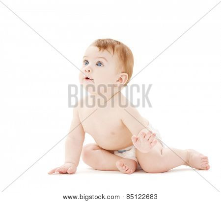 bright picture of crawling curious baby over white backgroubd