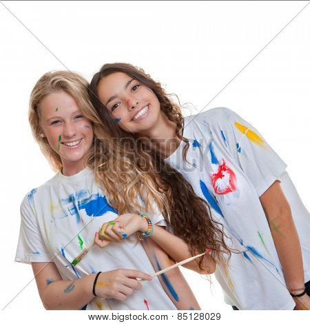 happy smiling studetns at art class with paint and brushes