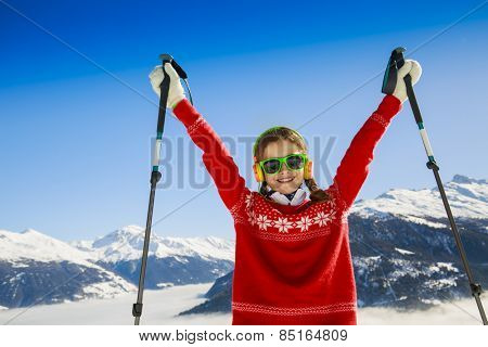 Winter vacation, snow, skier - girl enjoying winter