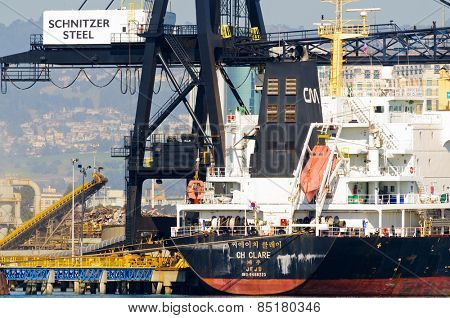 Alameda, CA - March 9, 2015: Oakland Shipyard, Schnitzer Steel exportation of steel scrap to China 