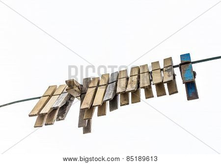 Old Clothespin Under Blue Sky I