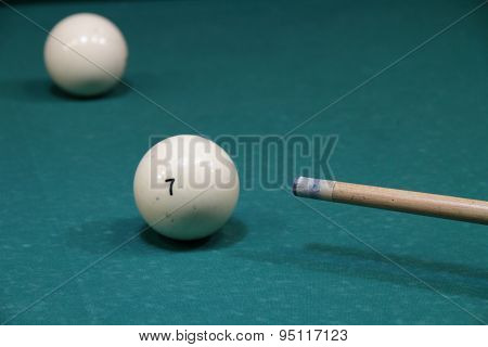 Billiard balls in a pool table in the closeup