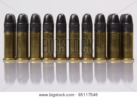 Cartridges 5.6 caliber on a white background