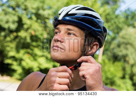 Professional cyclists wear a helmet for his safety