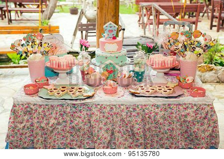 Prepared birthday table with sweets for children party