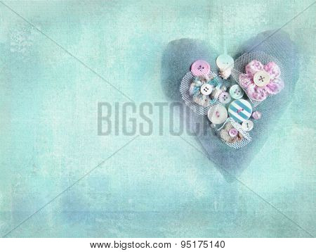 Handmade Heart On Grunge Turquoise Background.