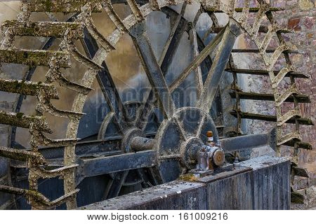 The Old And Wooden Whell Of Watermill In Sunshine